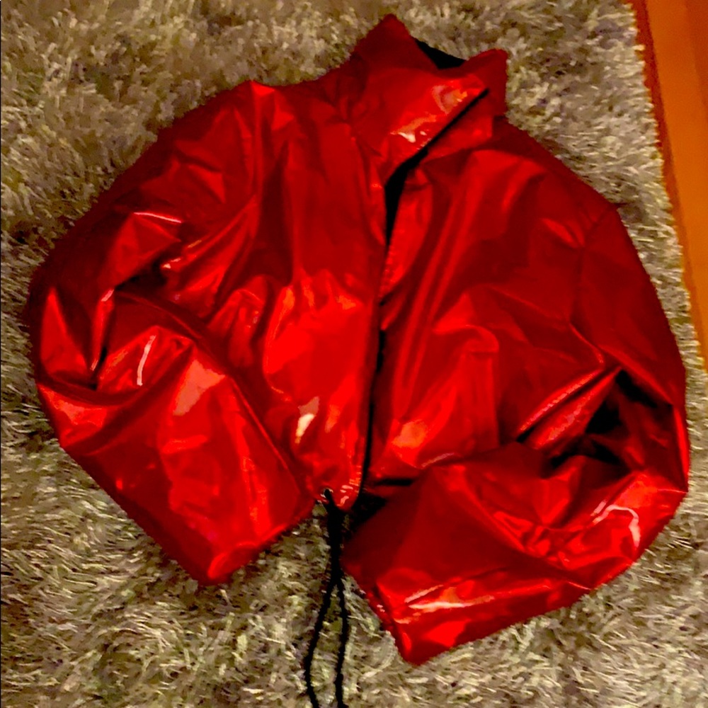 Shiny red glossy jacket oversized sleeves